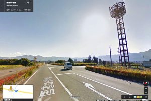 「阿蘇大御神御足跡石」前の鉄塔【国道325号線】